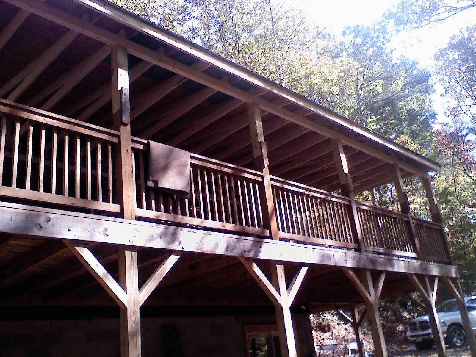 Timber framing under a new elevated porch and deck — Roof Leak Repair in Dorchester by Roofing Brothers